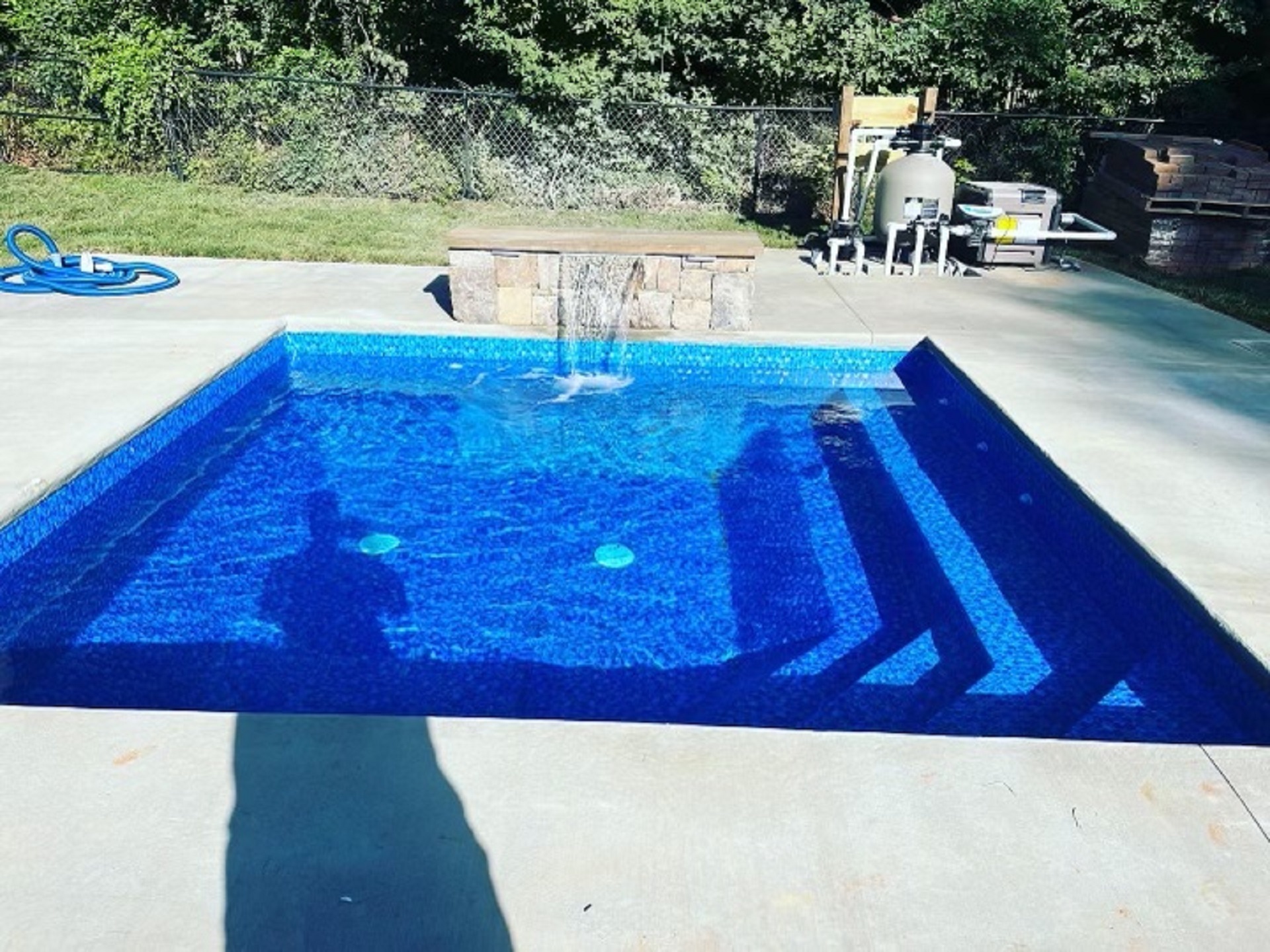 Pool with waterfall