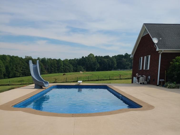 Pool with slide and roman end